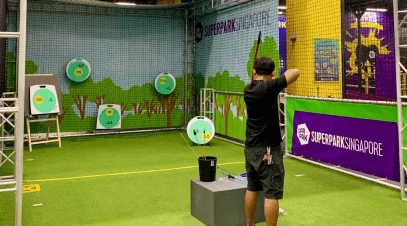 Man aiming in SuperPark Archery