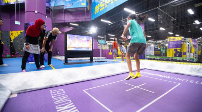 A Kid Bouncing in our Superjump Interactive Trampoline