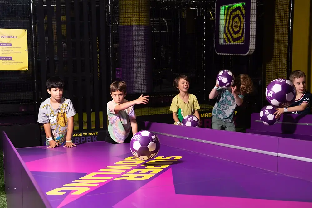 Kids play SuperBowling at SuperPark