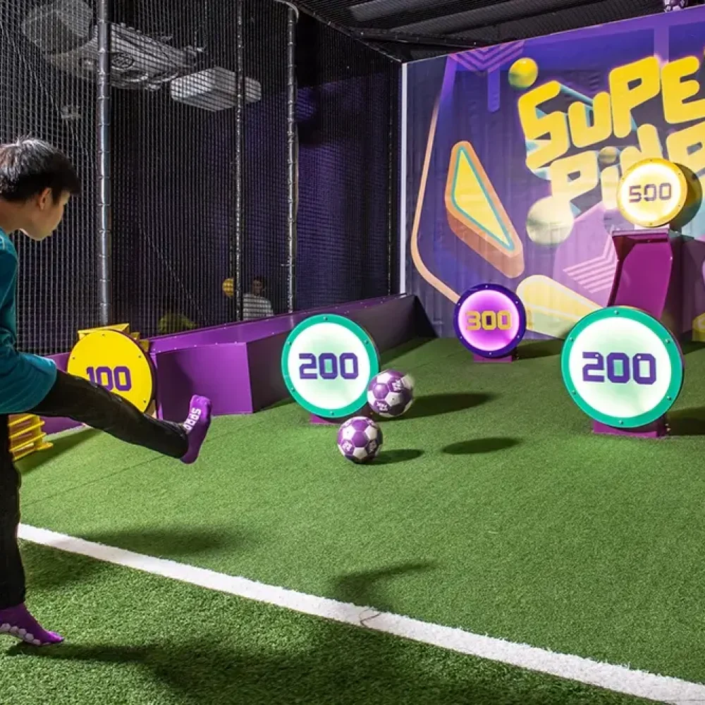 Kids play SuperPinball at SuperPark